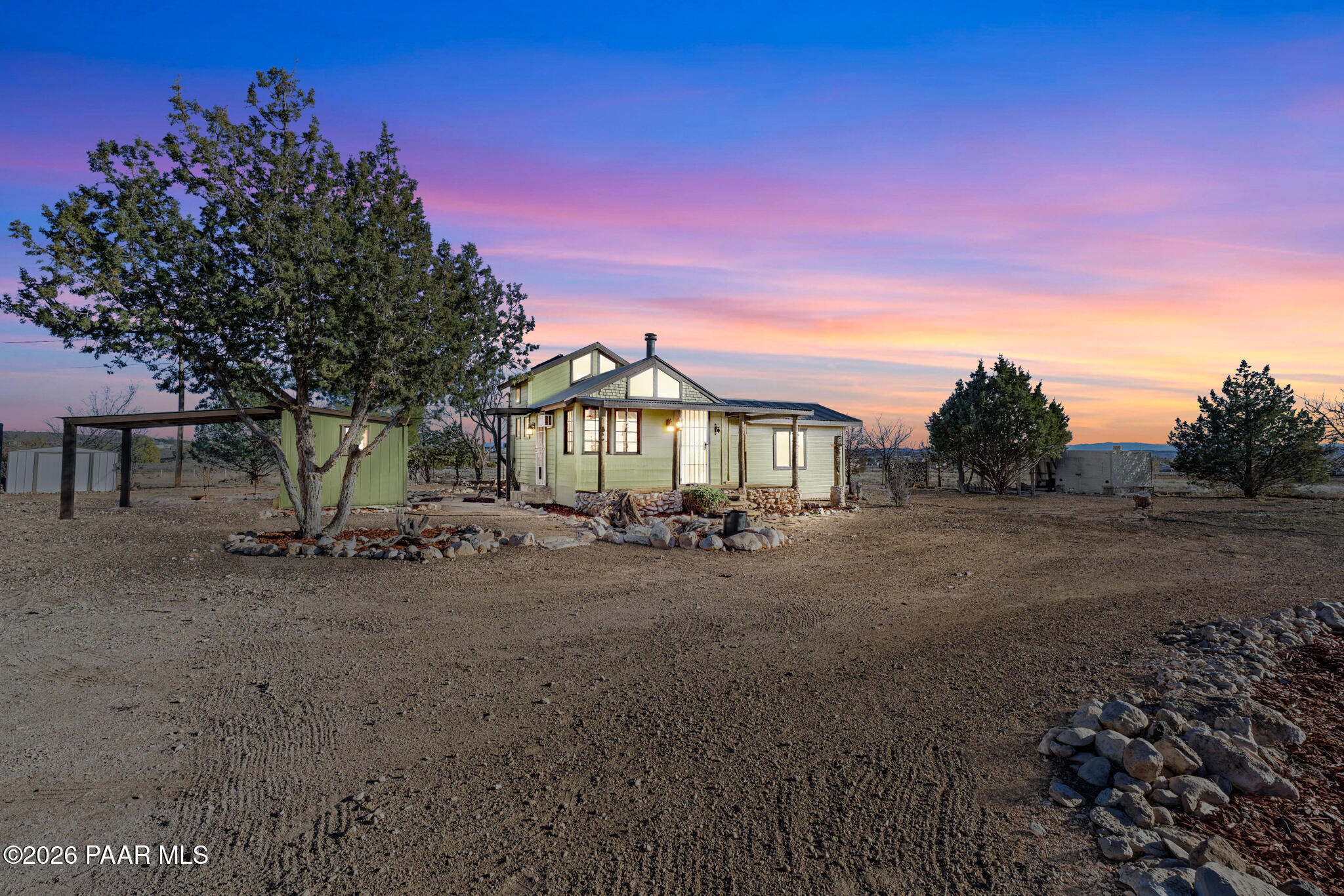685 West Iris Road Paulden, AZ 86334 - Photo 16 of 33 a view of a house with backyard and a tree
