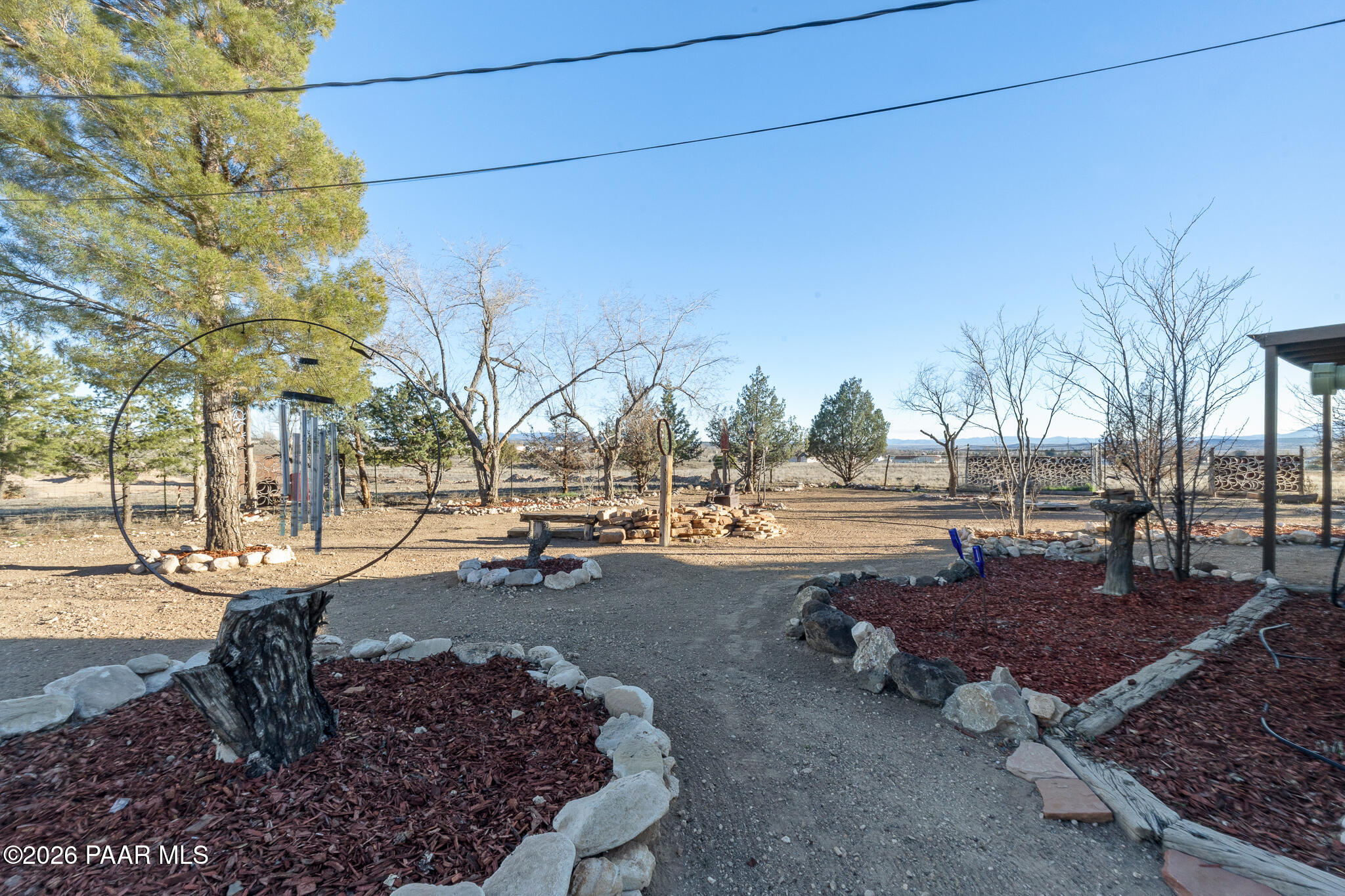 685 West Iris Road Paulden, AZ 86334 - Photo 4 of 33 a view of a yard with wooden fence