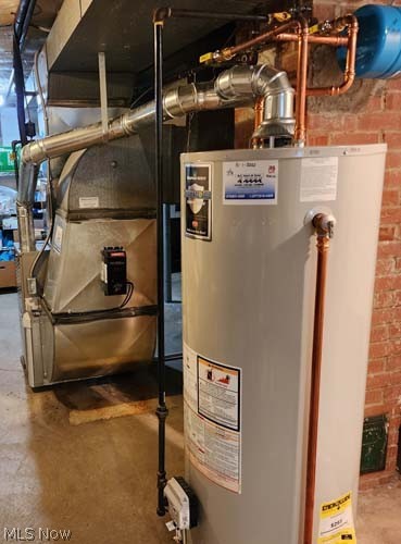 2443 Elmdale Road Cleveland, OH 44118 - Photo 23 of 24 Utility room featuring gas water heater