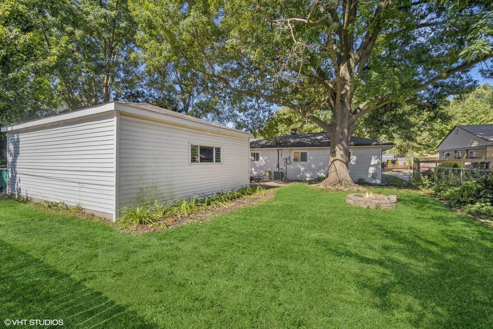 321 East Dennis Road Wheeling, IL 60090 - Photo 15 of 15 a view of a house with backyard and garden