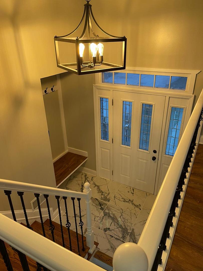 725 North Rohlwing Road Palatine, IL 60074 - Photo 9 of 27 a view of entryway with a front door
