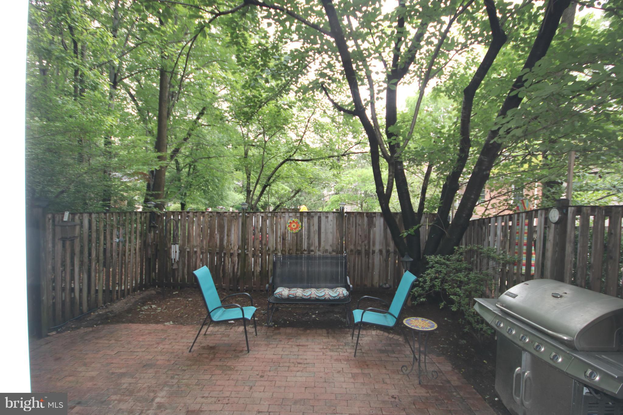 2408 Albot Road Reston, VA 20191 - Photo 25 of 29 Spacious brick patio amidst the trees
