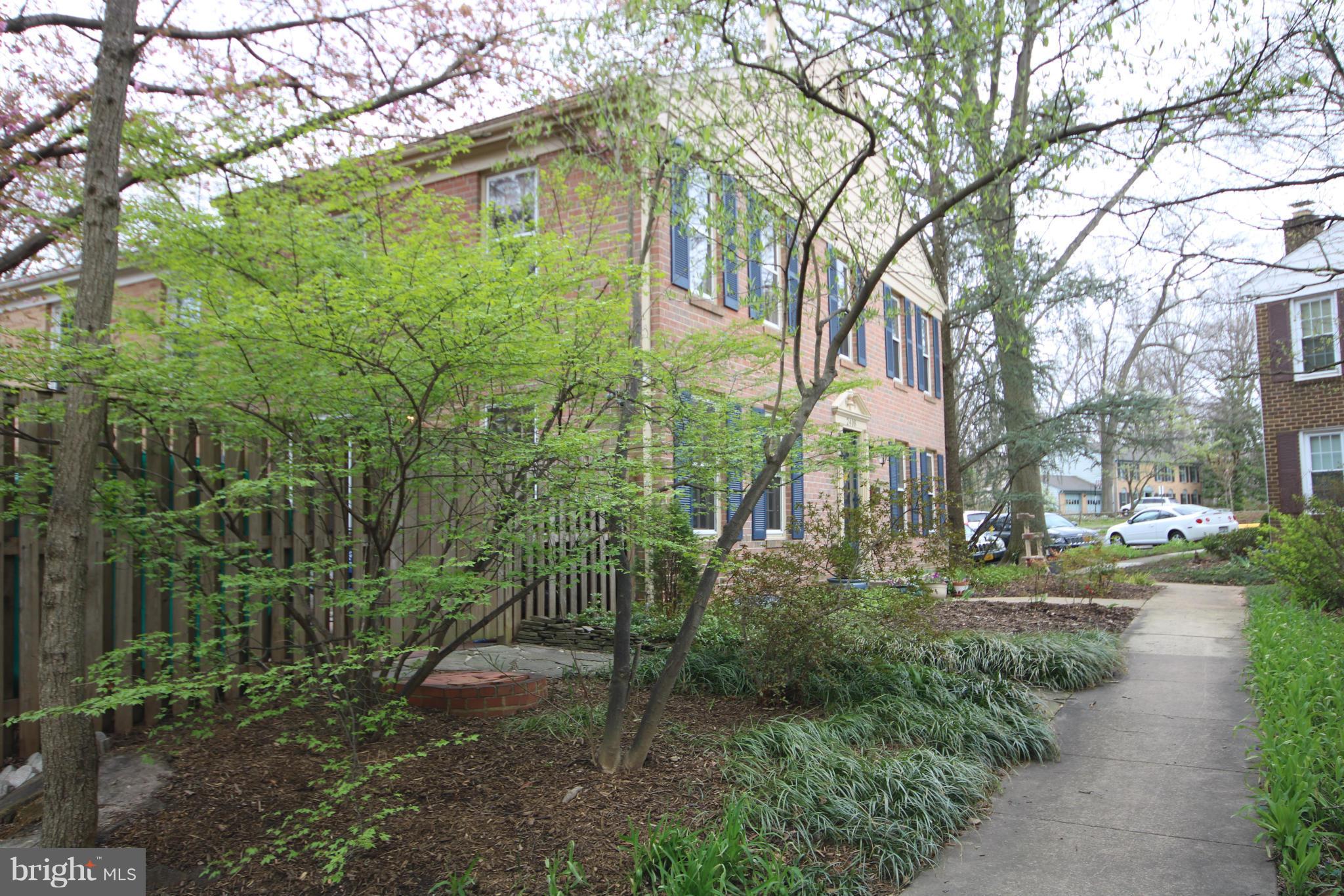 2408 Albot Road Reston, VA 20191 - Photo 27 of 29 Rear entrance to patio, lush with trees
