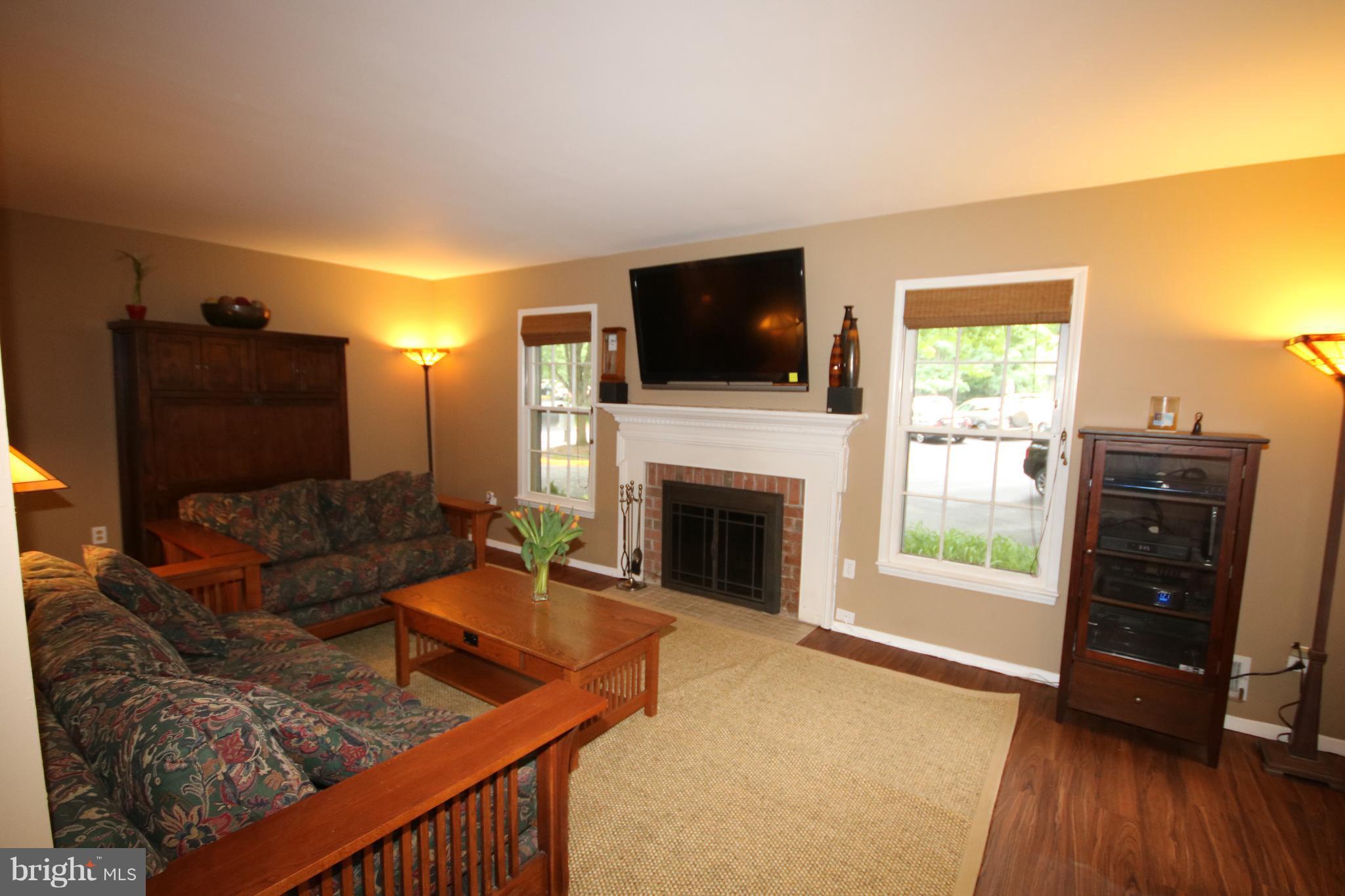 2408 Albot Road Reston, VA 20191 - Photo 4 of 29 Cozy living room with wood-burning fireplace