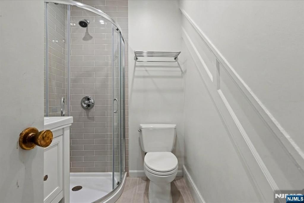436 Undercliff Avenue Edgewater, NJ 07020 - Photo 13 of 33 a bathroom with a toilet and a shower