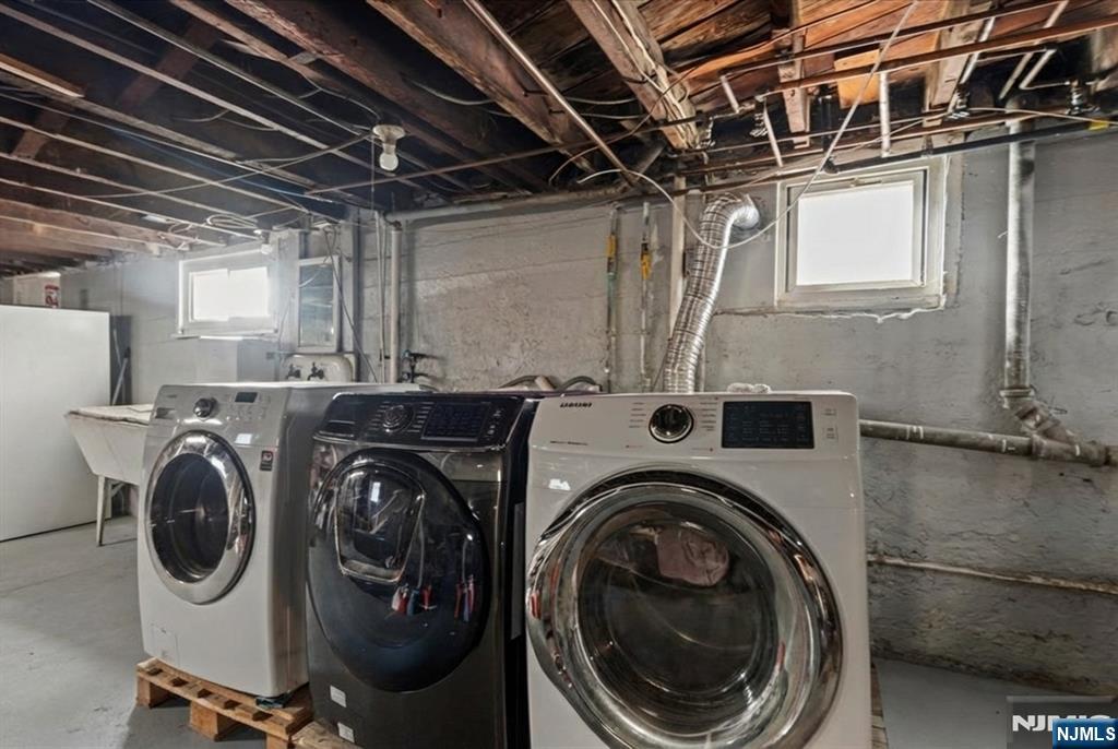436 Undercliff Avenue Edgewater, NJ 07020 - Photo 23 of 33 a utility room with dryer and washer