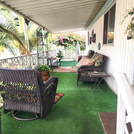 a garden view with a seating space