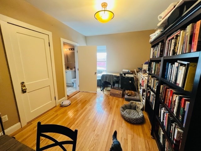 9 Rice Street, Unit 5 Brookline, MA 02445 - Photo 7 of 8 a view of a livingroom with furniture and toys