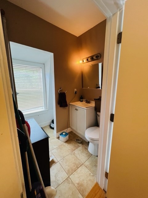 9 Rice Street, Unit 5 Brookline, MA 02445 - Photo 8 of 8 a bathroom with a sink a toilet a mirror and shower