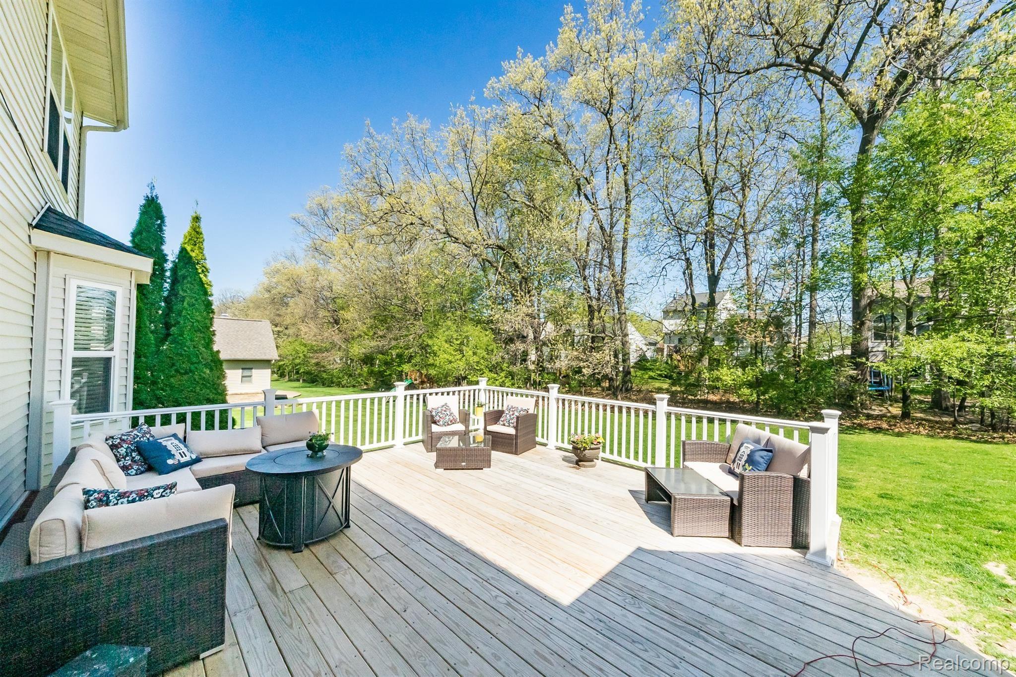9855 Viewcrest Court Howell, MI 48843 - Photo 27 of 30 Deck with multiple seating areas
