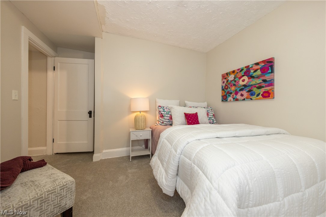 2116 Surrey Road, Unit 5 Cleveland, OH 44106 - Photo 14 of 19 The Bedroom with new carpet