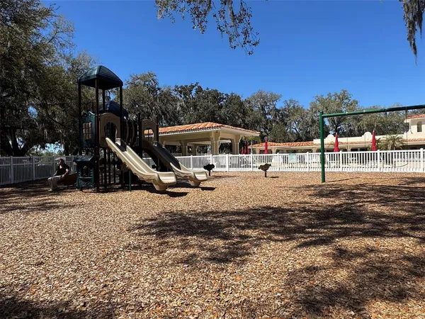 a view of a house with a park