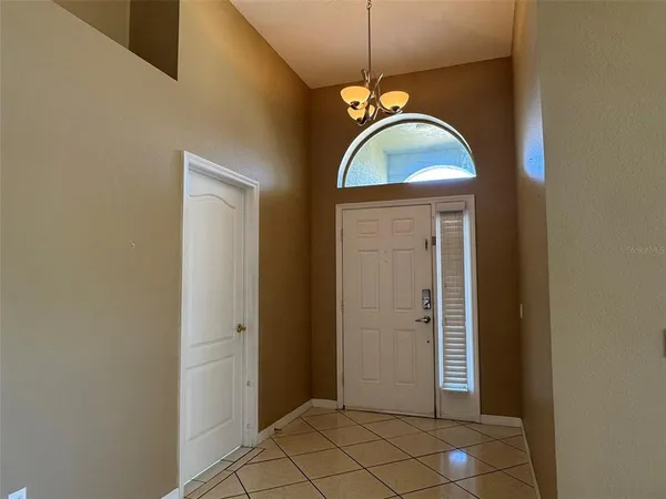 a view of a livingroom with a ceiling fan