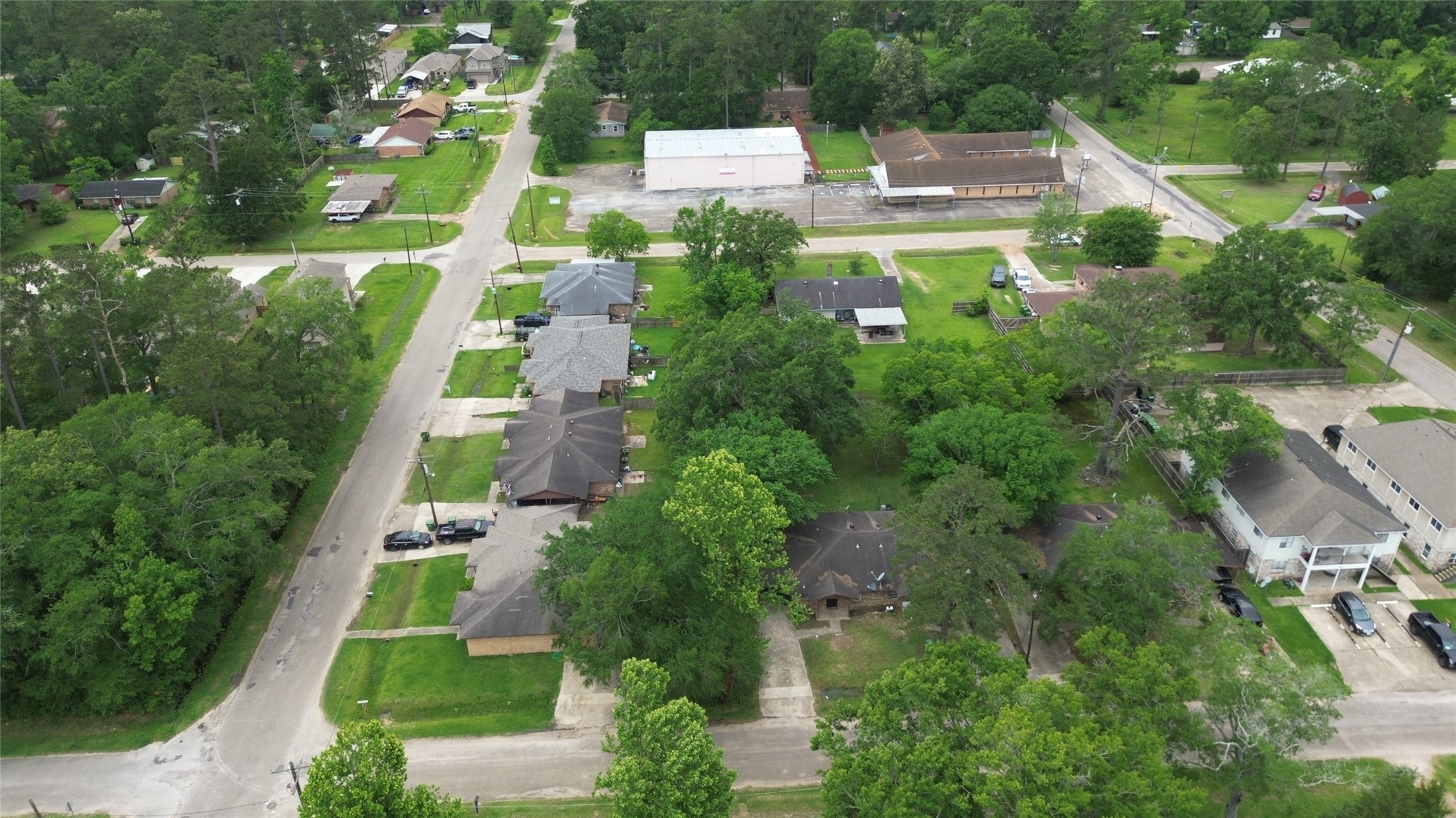 1401 Truman Street, Unit 1403 Cleveland, TX 77327 - Photo 7 of 9 an aerial view of residential houses with outdoor space and street view
