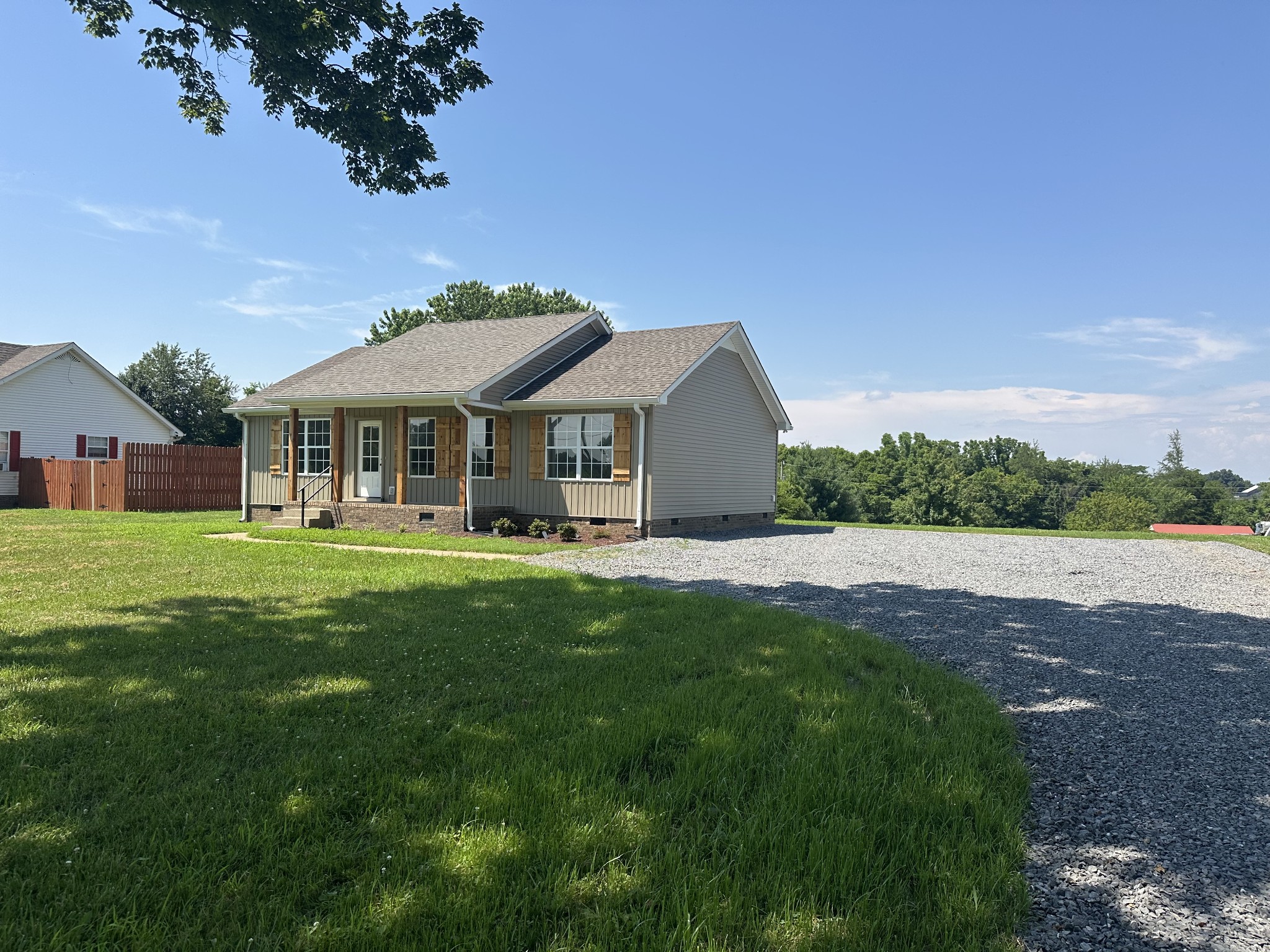 601 Lear Road Portland, TN 37148 - Photo 1 of 20 a front view of house with yard barbeque and outdoor seating