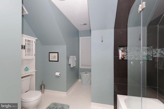 a view of a swimming pool with a lounge chairs