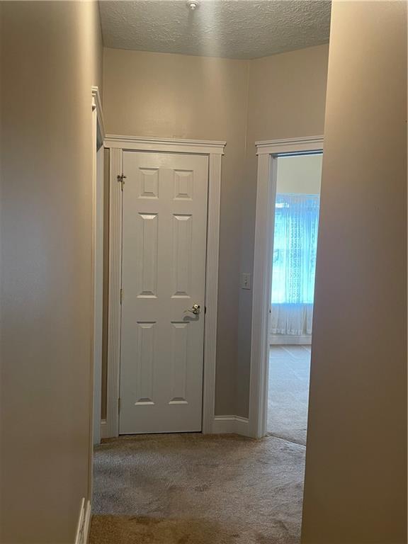 660 Riverside Drive, Unit 1D Beaver, PA 15009 - Photo 8 of 16 Hall to bedrooms