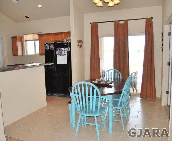 2020 Roma Avenue Fruita, CO 81521 - Photo 4 of 9 a dining room with furniture and window