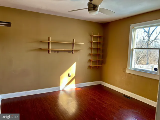 a view of a room with racks on the wall