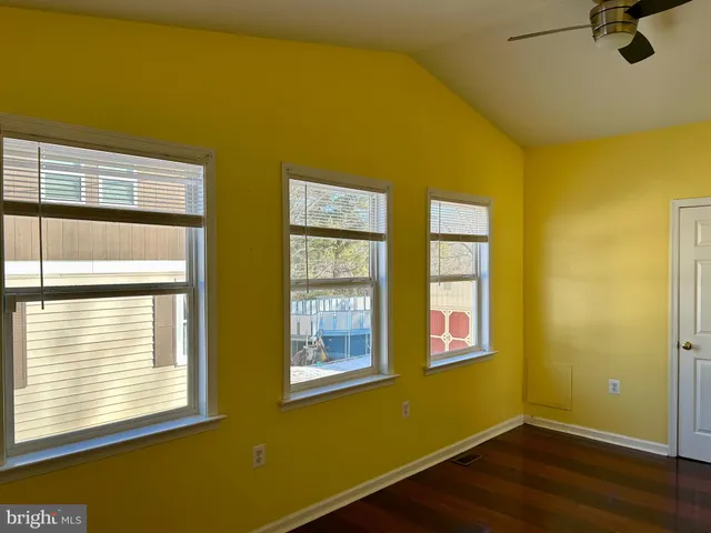 a view of a room with windows
