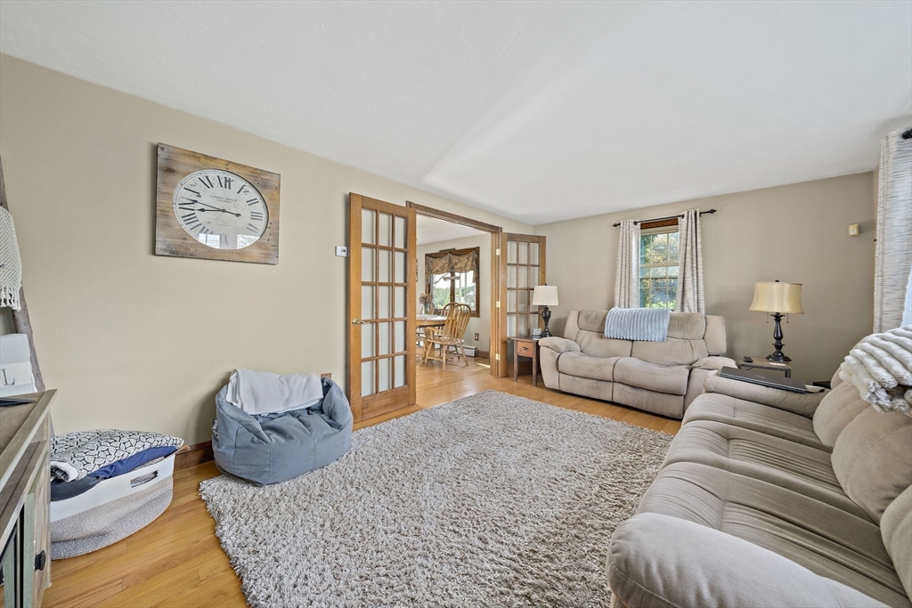 164 Hancock Street Abington, MA 02351 - Photo 11 of 42 a living room with furniture rug and window