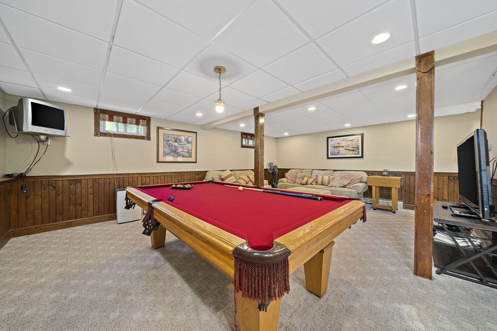 164 Hancock Street Abington, MA 02351 - Photo 20 of 42 a room with pool table and flat screen tv