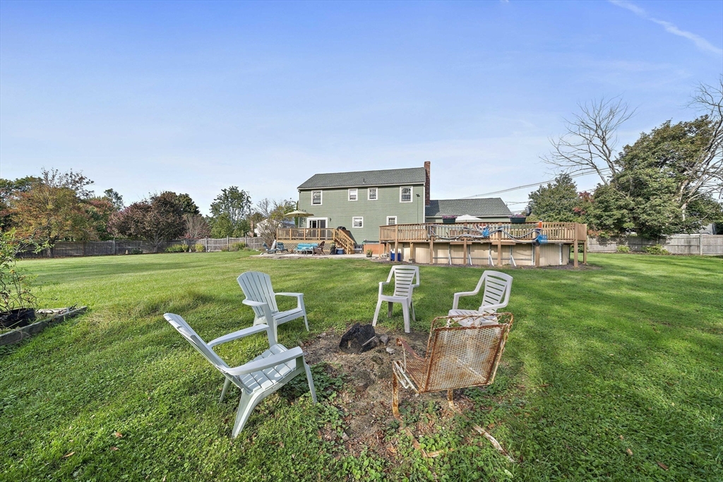 164 Hancock Street Abington, MA 02351 - Photo 31 of 42 a view of a table and chairs in the garden