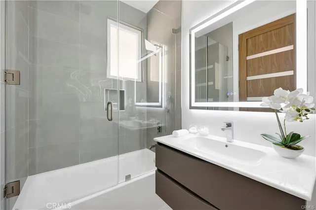 a bathroom with a sink and a bathtub