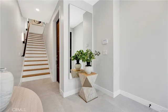 a view of a hallway with seating area