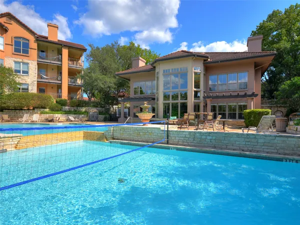 a view of pool with an outdoor seating