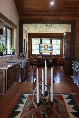 a bathroom with a large tub sink shower and double vanity