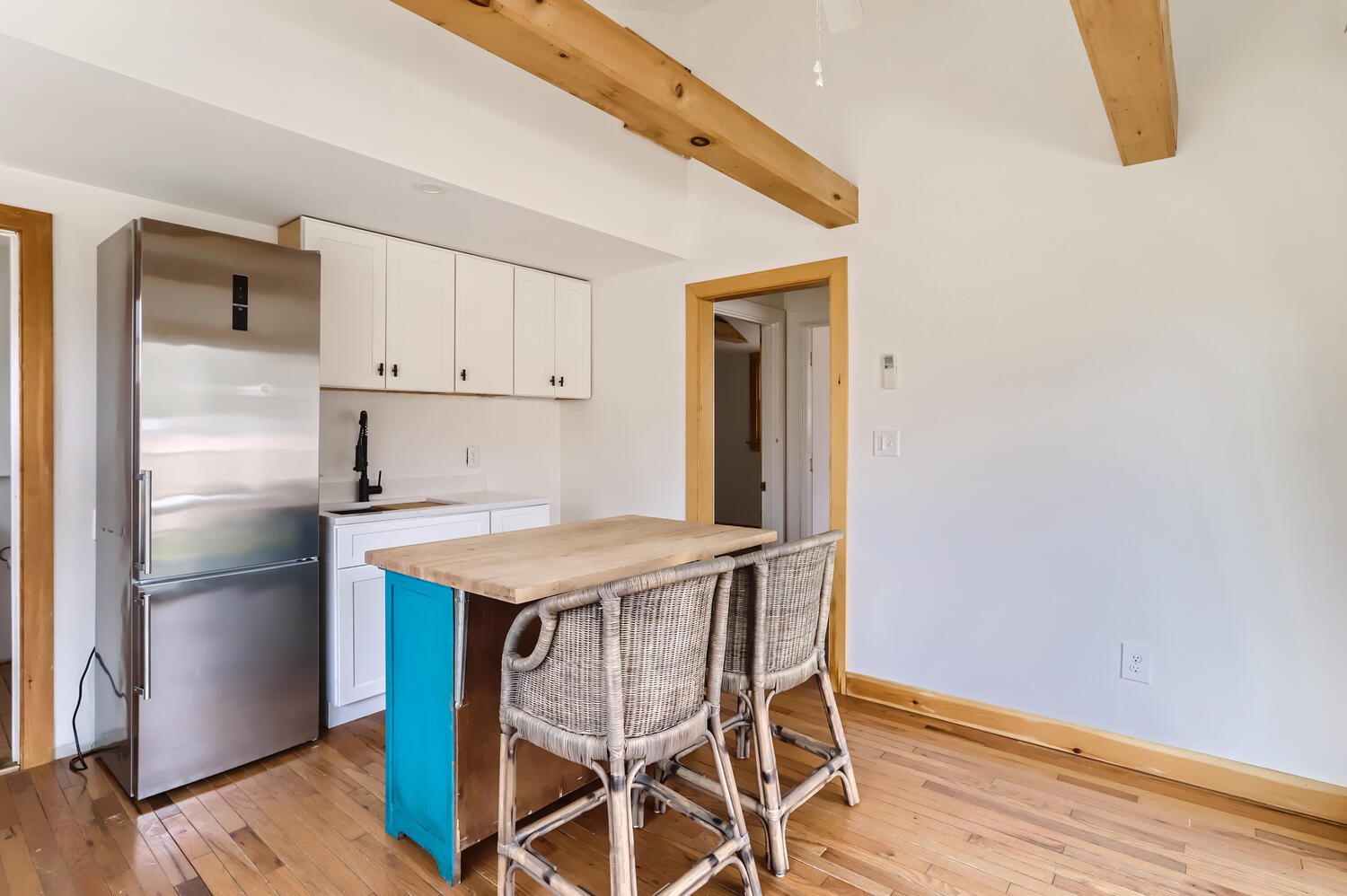 95 Summer Street Vineyard Haven, MA 02568 - Photo 14 of 23 a kitchen with a table and refrigerator