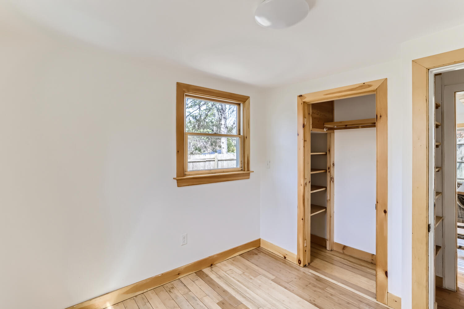95 Summer Street Vineyard Haven, MA 02568 - Photo 17 of 23 a view of a room with wooden floor and closet