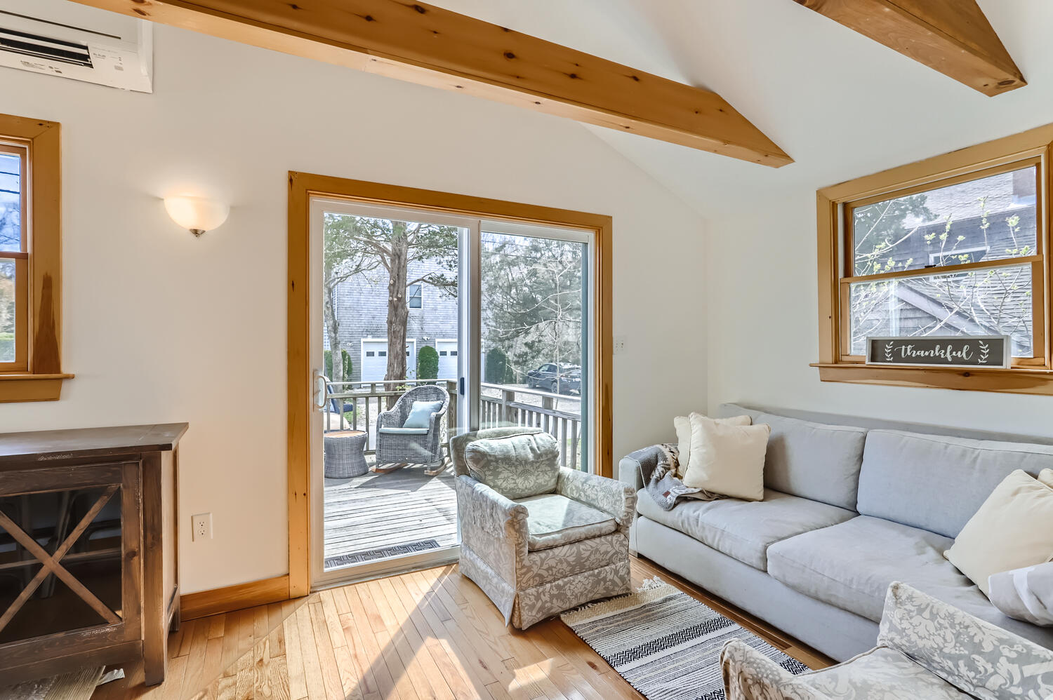 95 Summer Street Vineyard Haven, MA 02568 - Photo 6 of 23 a living room with furniture and a floor to ceiling window
