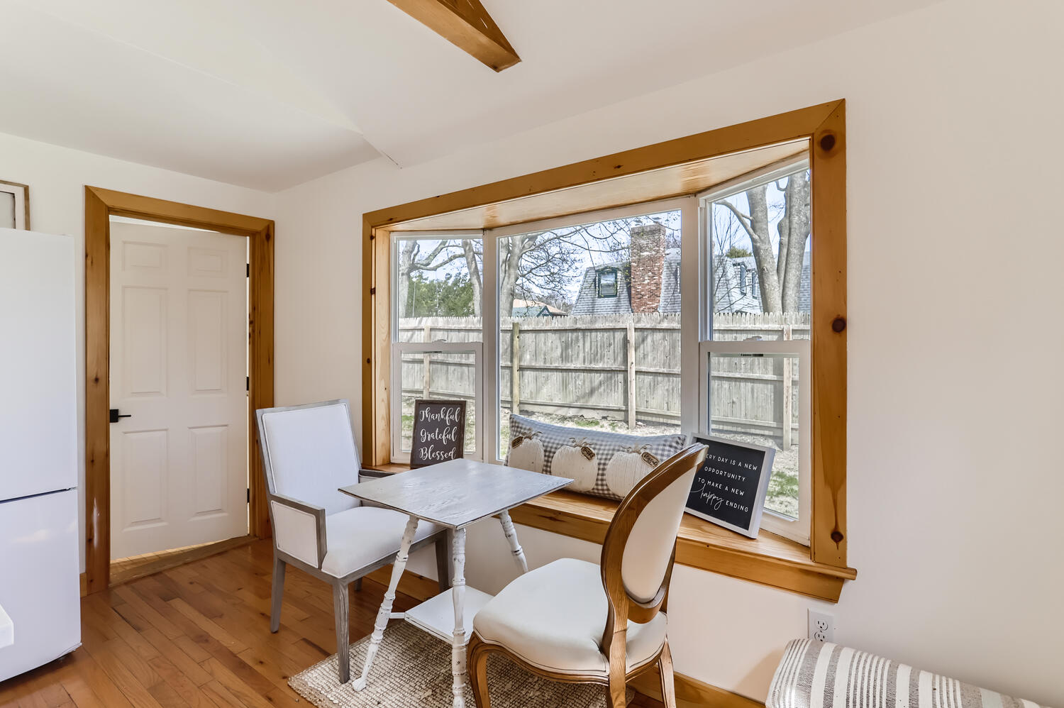 95 Summer Street Vineyard Haven, MA 02568 - Photo 8 of 23 a view of a dining room with furniture and a window