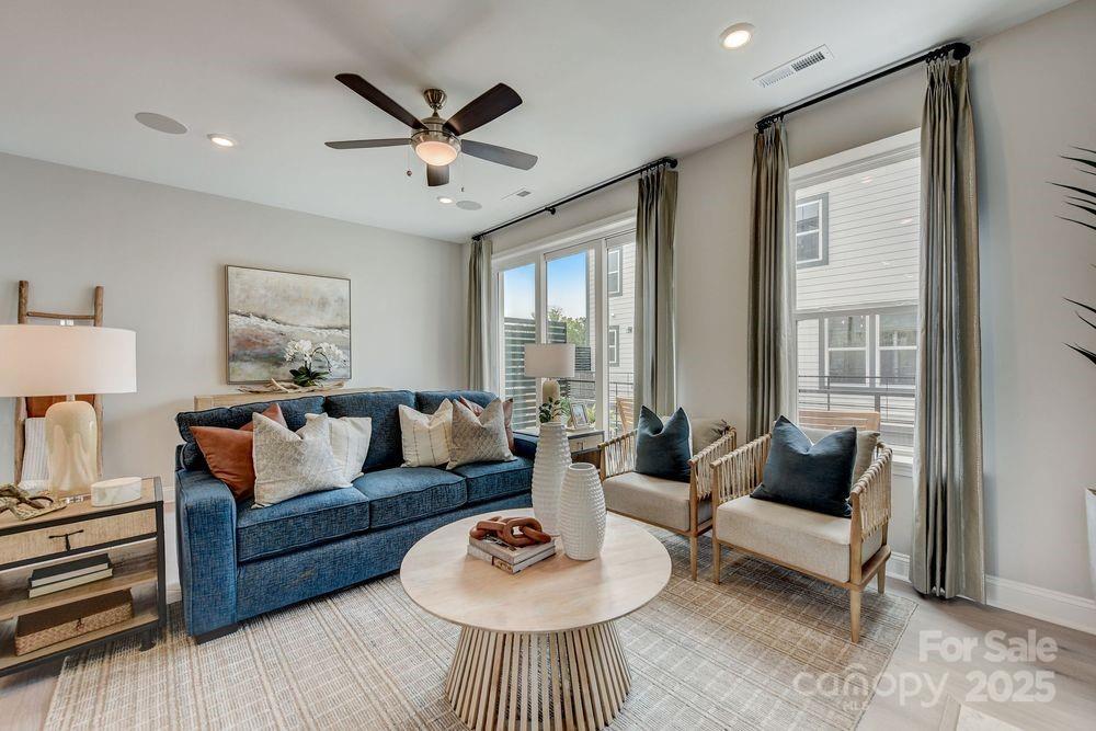 541 Annie Lowery Way Davidson, NC 28036 - Photo 11 of 29 a living room with furniture and a large window