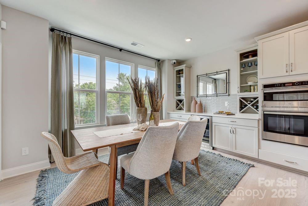 541 Annie Lowery Way Davidson, NC 28036 - Photo 17 of 29 a view of a dining room with furniture window and outside view