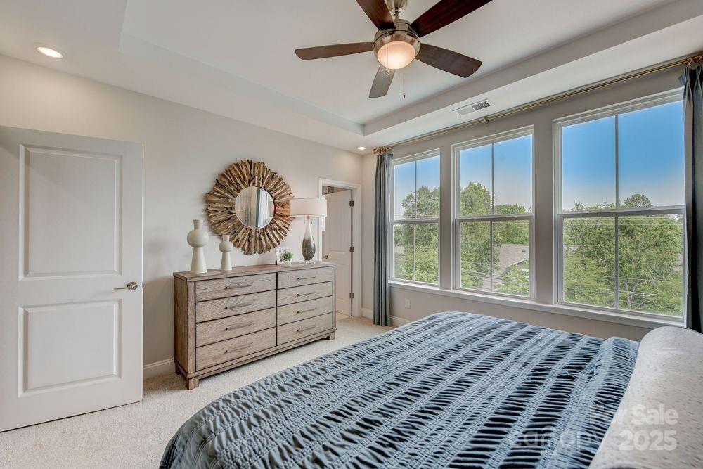 541 Annie Lowery Way Davidson, NC 28036 - Photo 21 of 29 a bedroom with a bed and a window