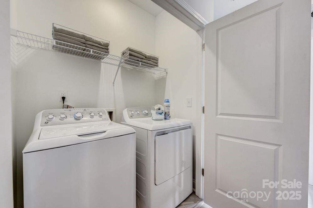 541 Annie Lowery Way Davidson, NC 28036 - Photo 23 of 29 a utility room with dryer and washer