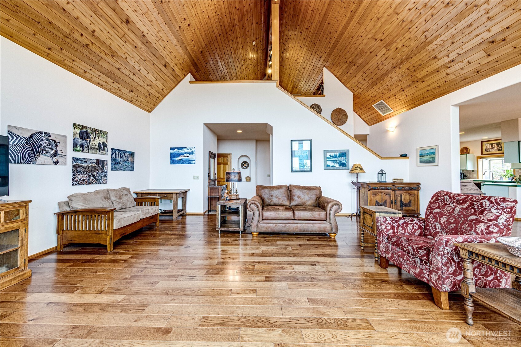 273 Harbor Heights Road Port Angeles, WA 98362 - Photo 14 of 40 a living room with furniture and a wooden floor