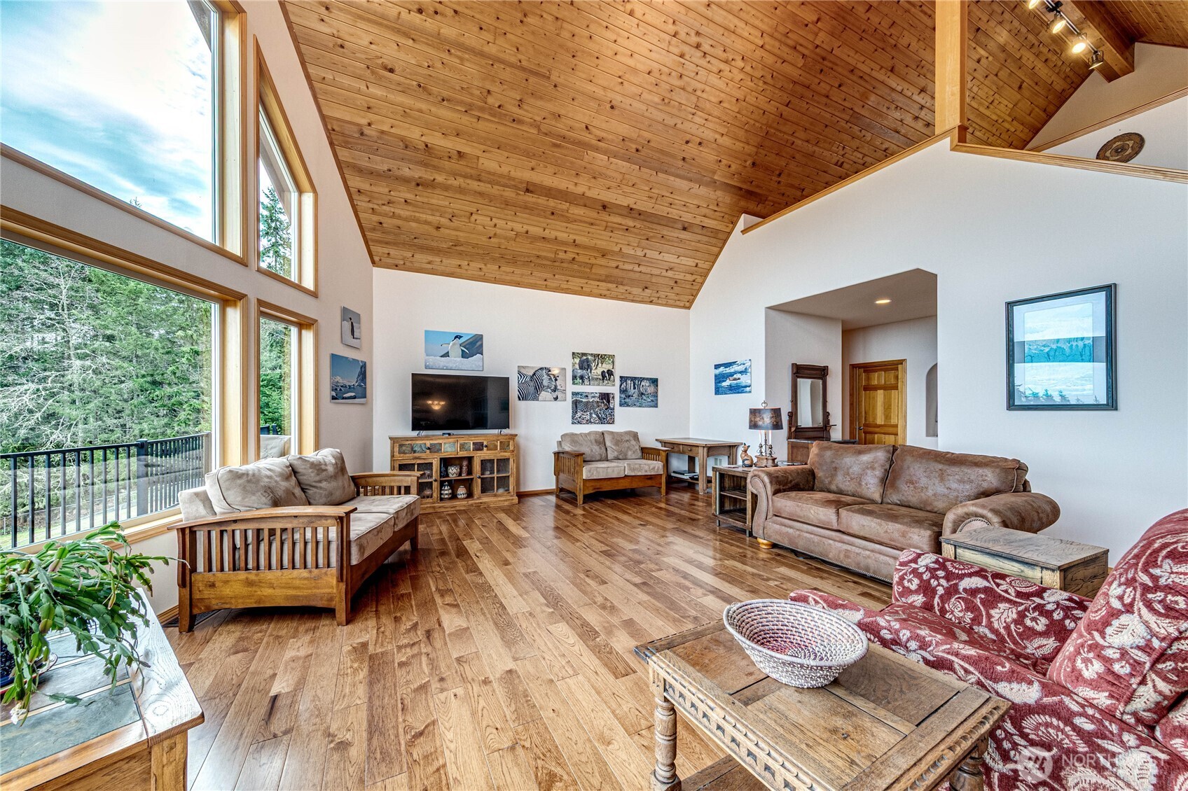 273 Harbor Heights Road Port Angeles, WA 98362 - Photo 15 of 40 a living room with furniture and a flat screen tv