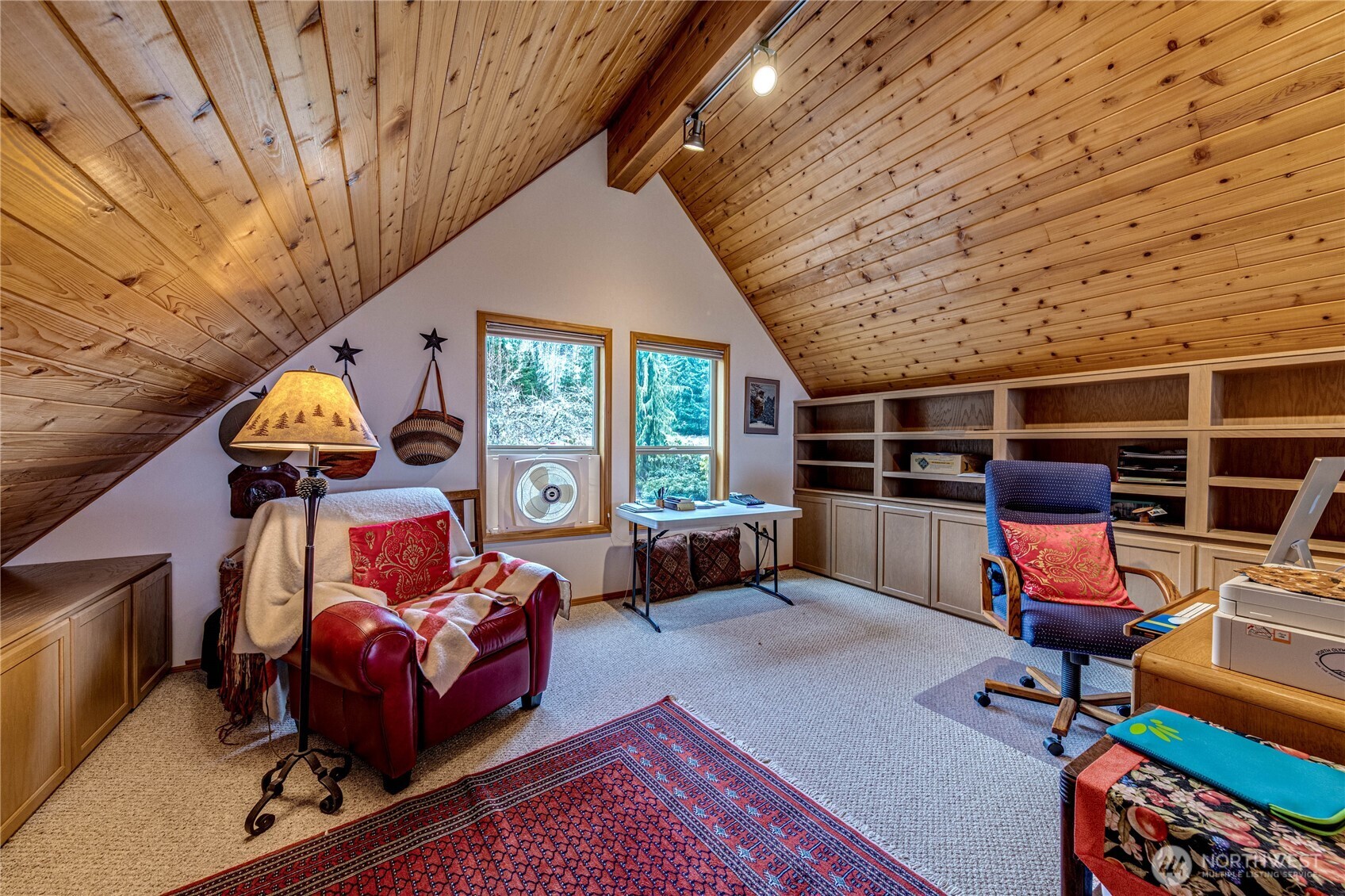 273 Harbor Heights Road Port Angeles, WA 98362 - Photo 16 of 40 a bedroom with furniture and a window