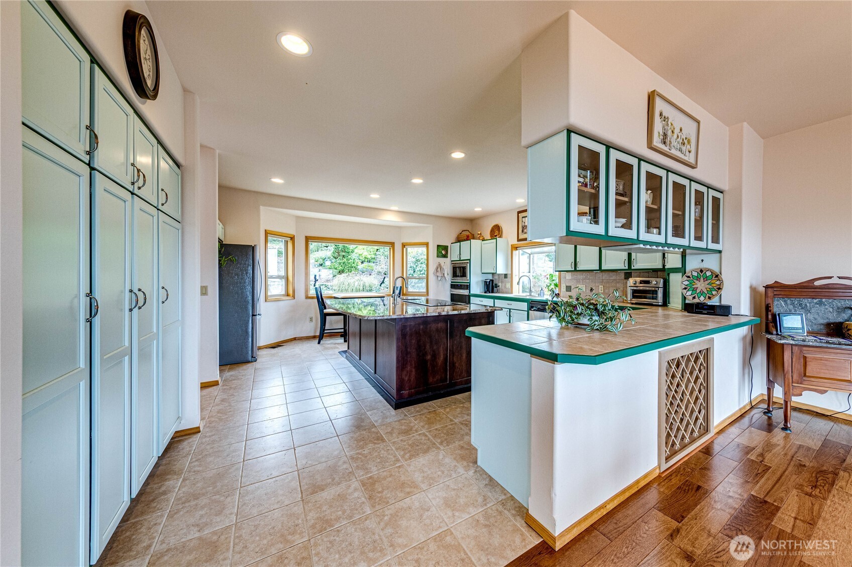 273 Harbor Heights Road Port Angeles, WA 98362 - Photo 19 of 40 a view of a kitchen and dining room