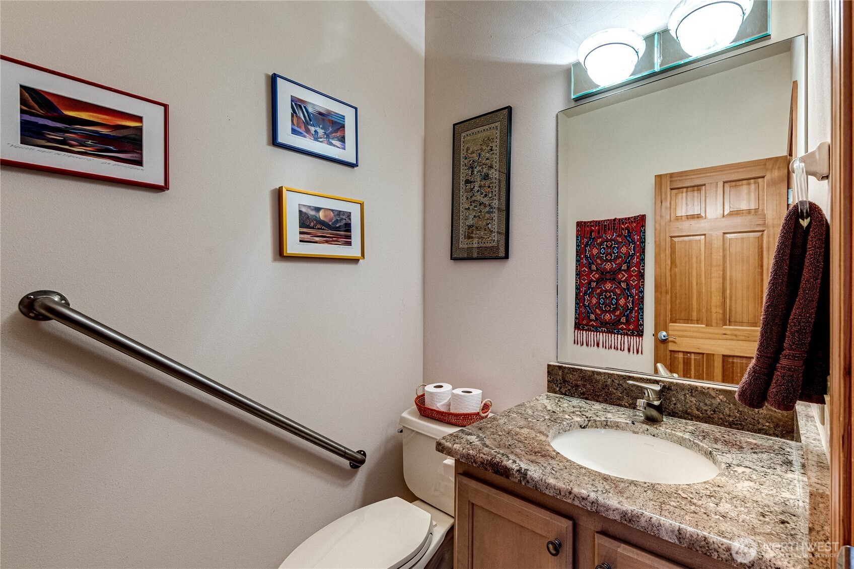 273 Harbor Heights Road Port Angeles, WA 98362 - Photo 22 of 40 a bathroom with a granite countertop sink mirror vanity and toilet