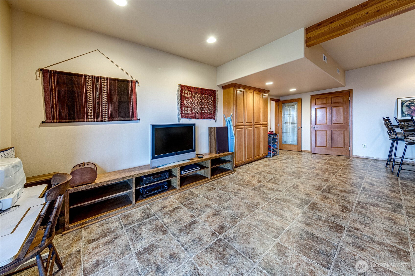 273 Harbor Heights Road Port Angeles, WA 98362 - Photo 31 of 40 a bedroom with furniture and a flat screen tv