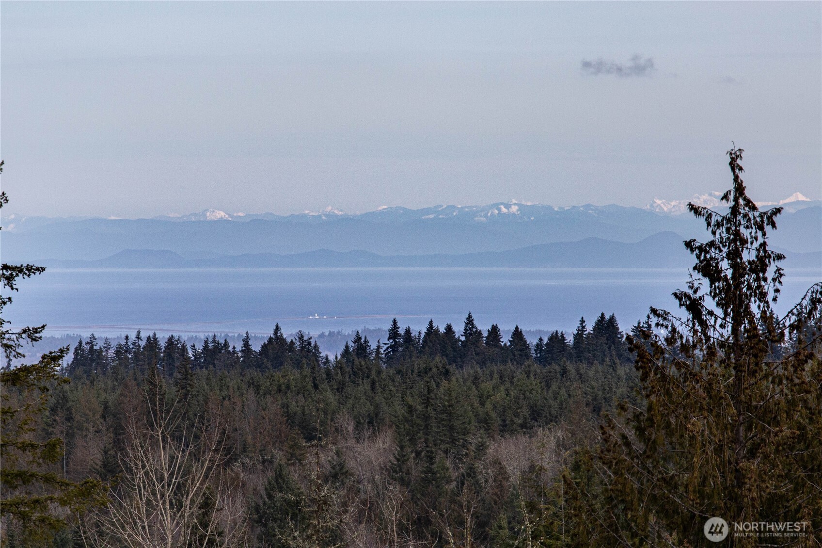 273 Harbor Heights Road Port Angeles, WA 98362 - Photo 34 of 40 a view of a lake and a mountain