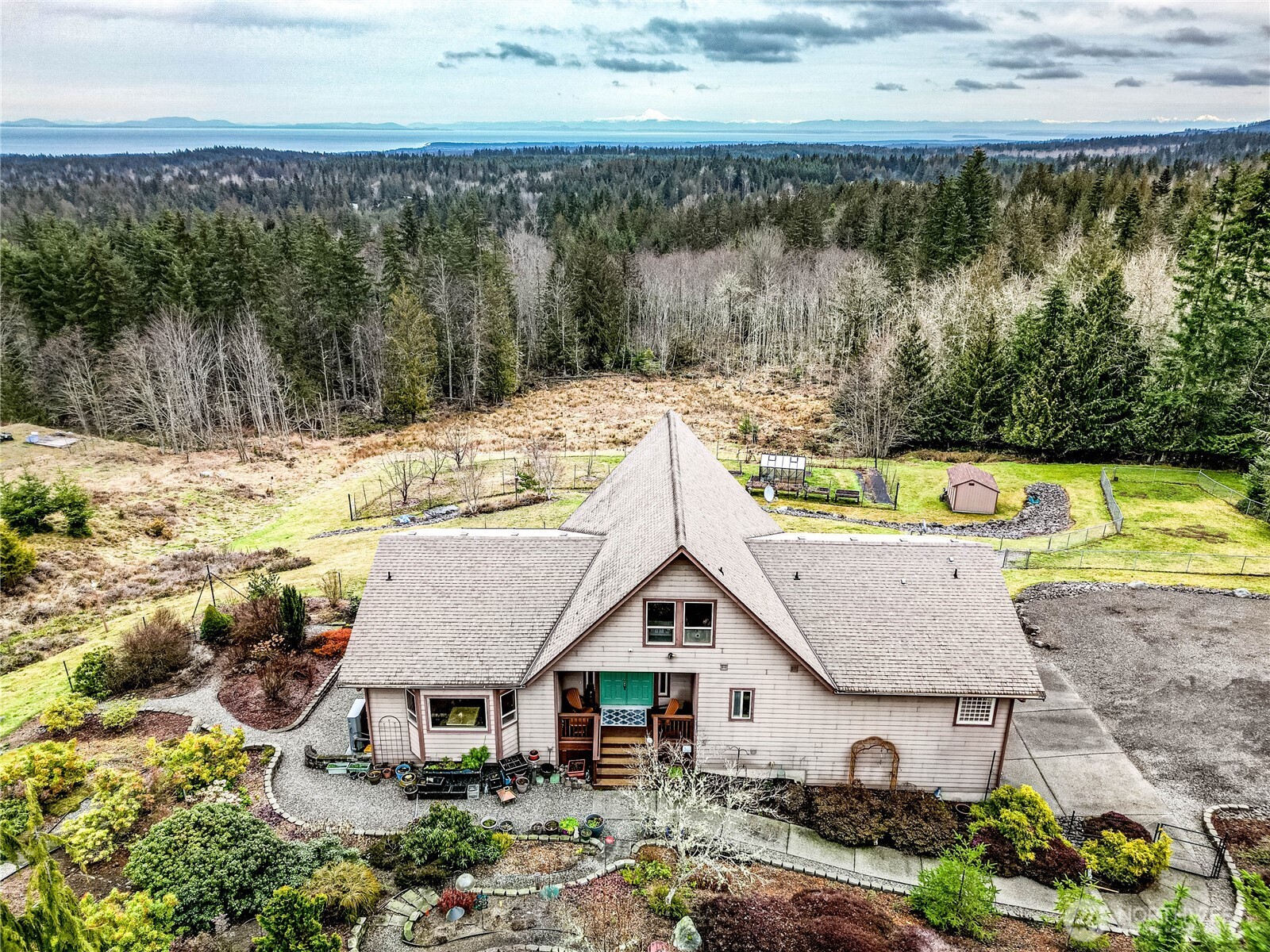 273 Harbor Heights Road Port Angeles, WA 98362 - Photo 37 of 40 an aerial view of a house with a yard and lake view