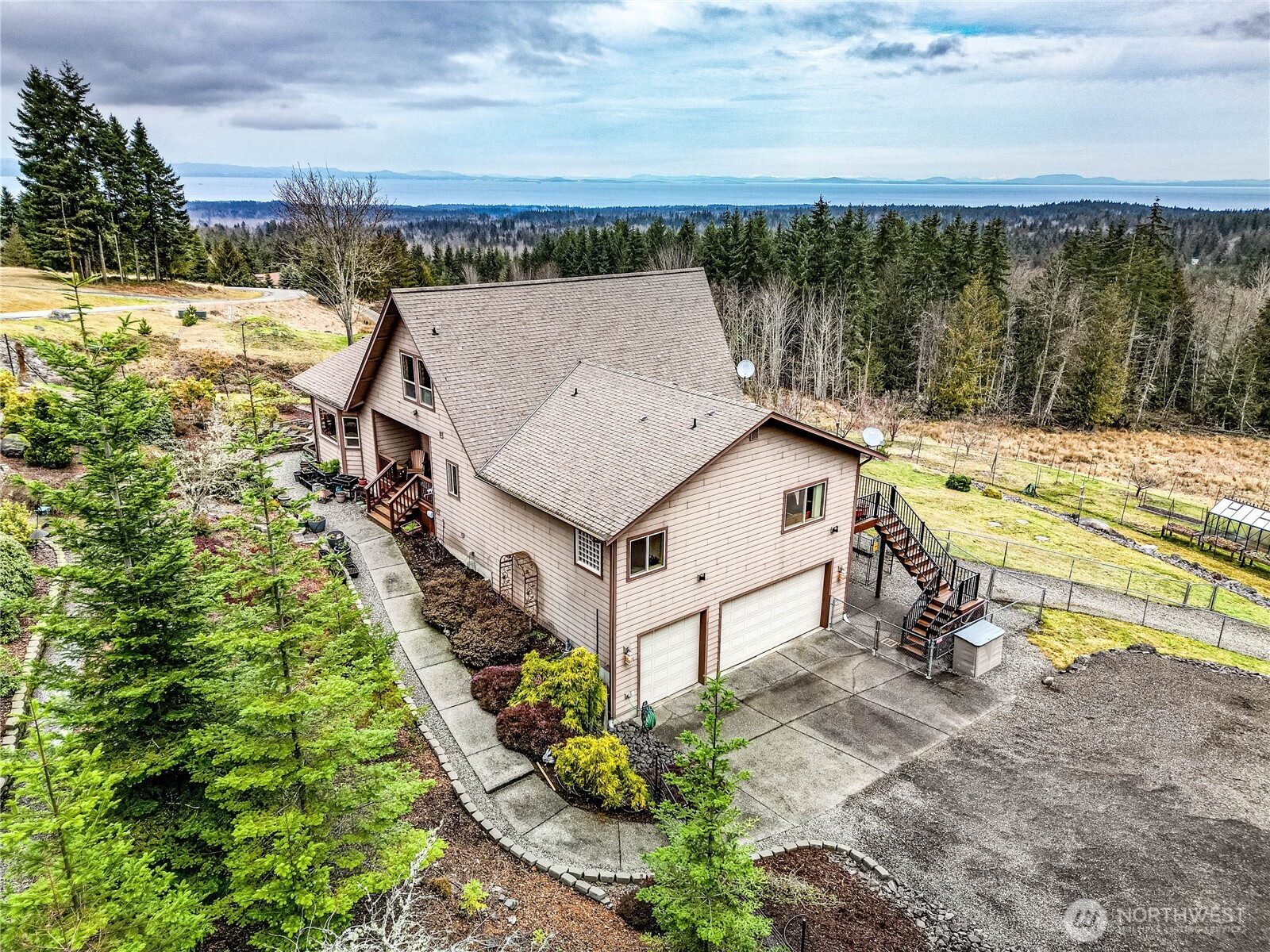 273 Harbor Heights Road Port Angeles, WA 98362 - Photo 4 of 40 a view of a house with a yard