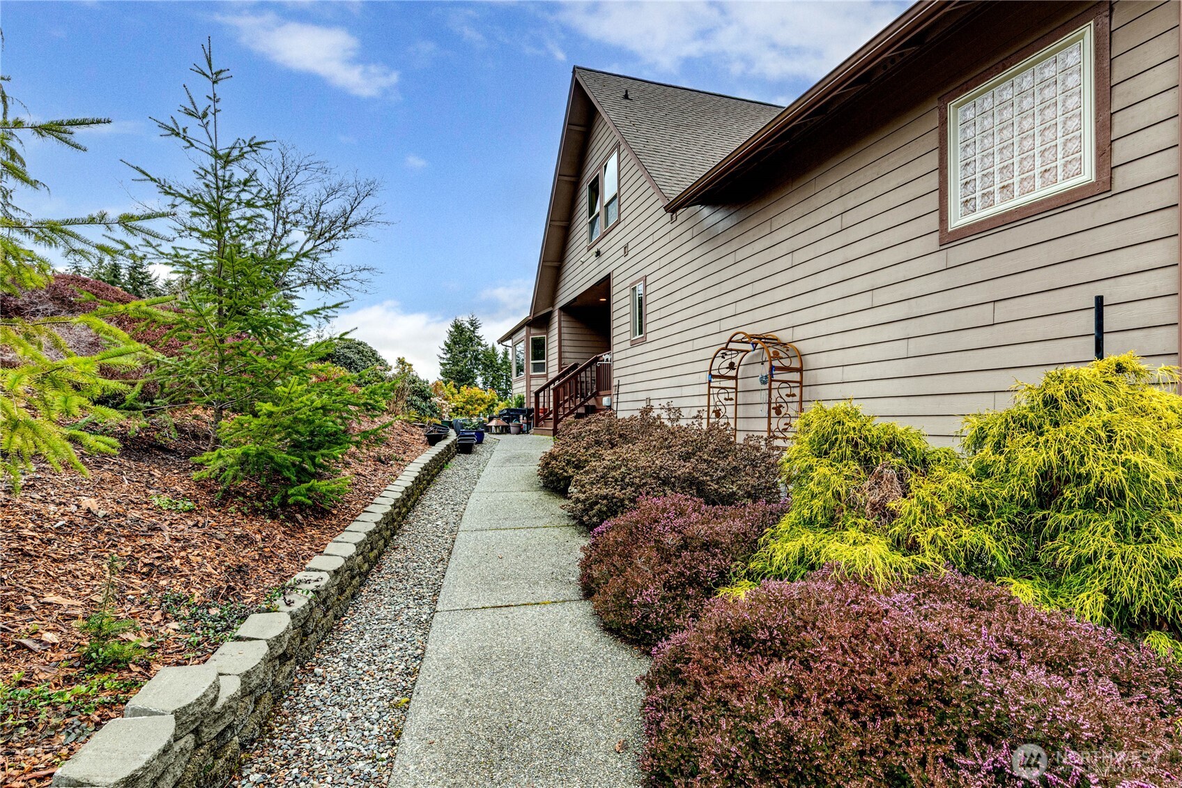 273 Harbor Heights Road Port Angeles, WA 98362 - Photo 5 of 40 a view of a pathway with a house