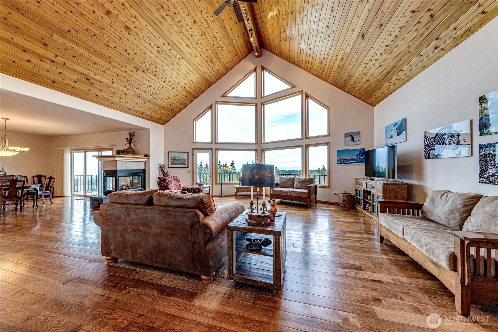 273 Harbor Heights Road Port Angeles, WA 98362 - Photo 8 of 40 a living room with furniture and a large window